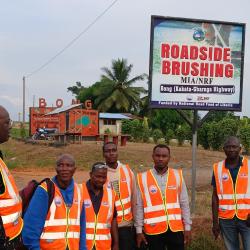 Photo credit: MIA Asst. Min. for Technical Services Orando F. Armah provides instruction to the Road Inspection Delegation