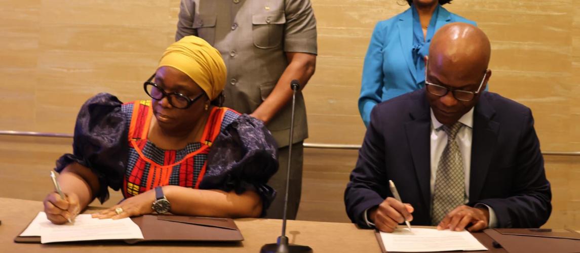 (L-R) Liberia's Foreign Minister, Hon Sara Beysolow-Nyanti and Cybaston Institute of Technology President and CEO, Dr. Thierry Wandji sign the agreement; New York, September 23, 2024.