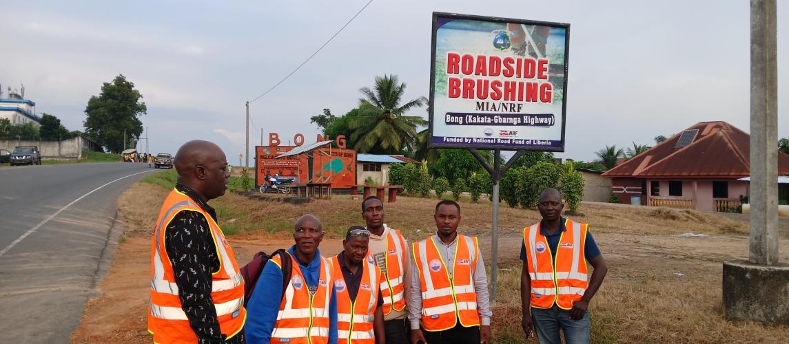 Photo credit: MIA Asst. Min. for Technical Services Orando F. Armah provides instruction to the Road Inspection Delegation