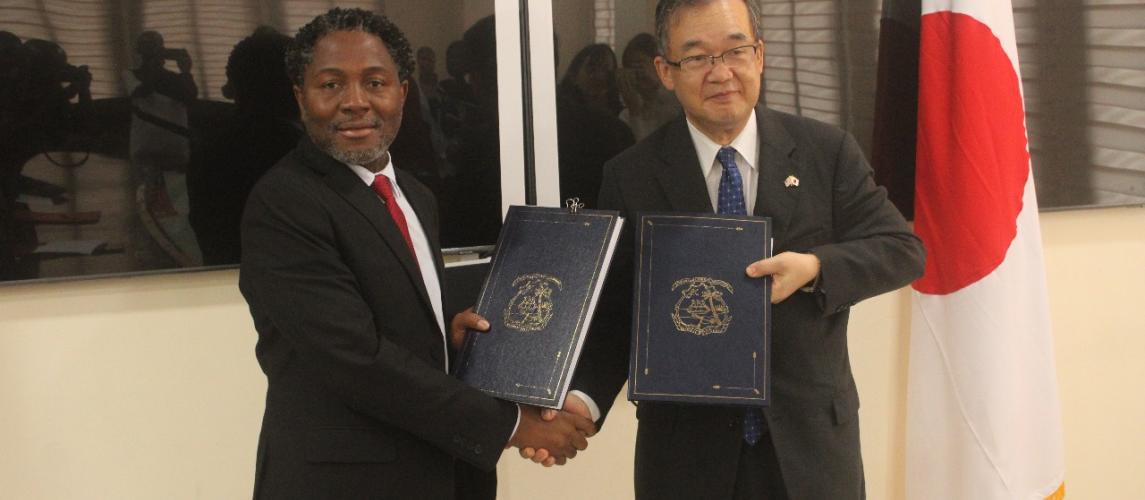 Liberia’s Deputy Minister for International Cooperation and Economic Integration, Dr. Ibrahim Al-bakri Nyei exchange notes with Japan’s Ambassador to Liberia, His Excellency Mr. Hiroshi Yoshimoto 