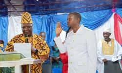 Hon. Karyou Johnson takes the oath as the 46th Superintendent of Grand Bassa County at the Unification Pavilion on March 14, marking a new era of leadership under the guidance of Hon. F. Sakila Nyumalin, Sr., Minister of Internal Affairs.