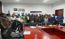 Participants pose for photo